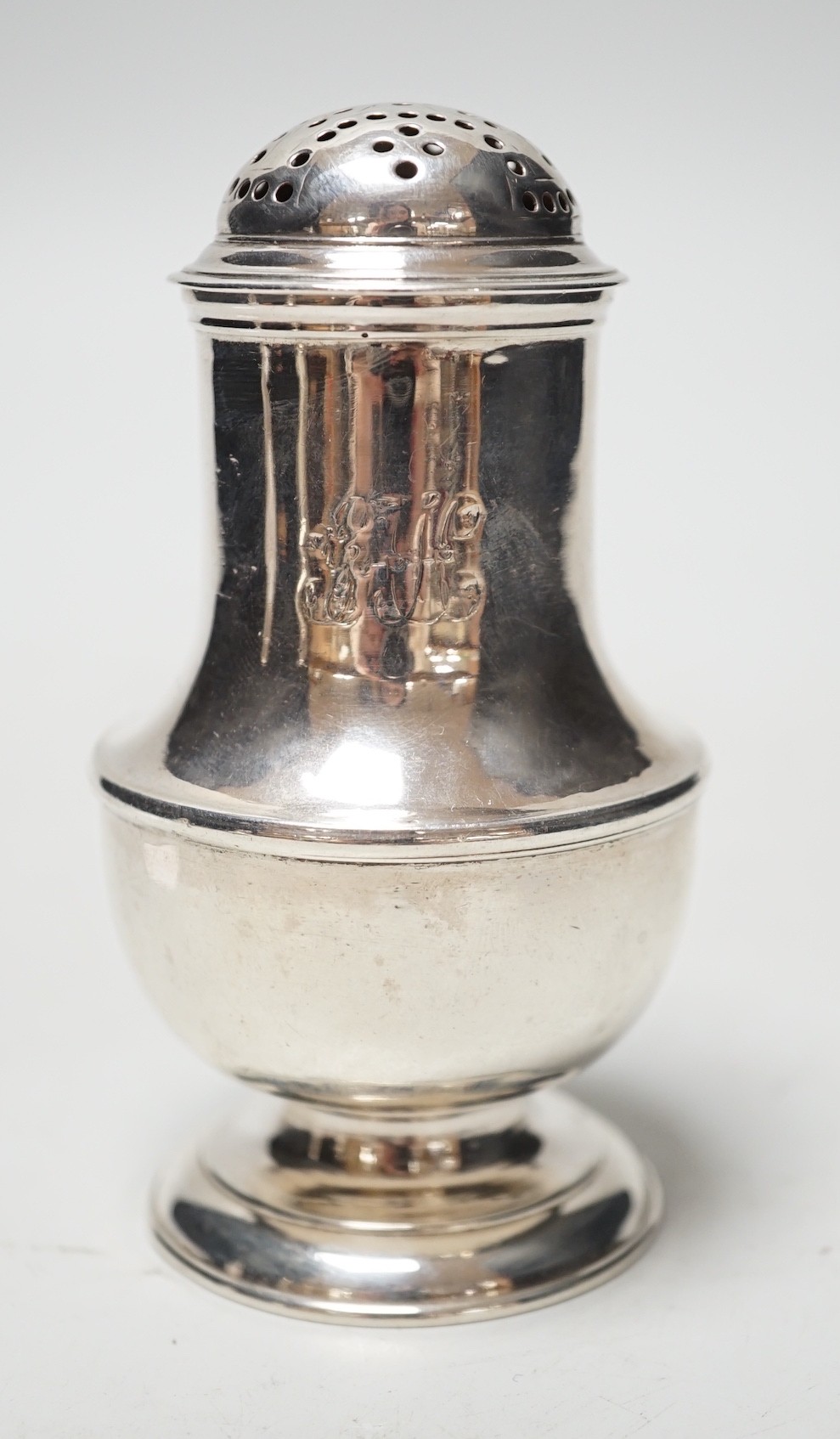 An early George II silver bun shaped pepperette, Thomas Bamford, London, 1728, 10.6cm, 4.2oz.